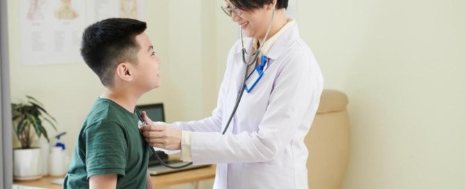 Your Guide to Doctors and Pricing at Gleneagles Hospital Kota Kinabalu 7 A doctor checking a child patient.